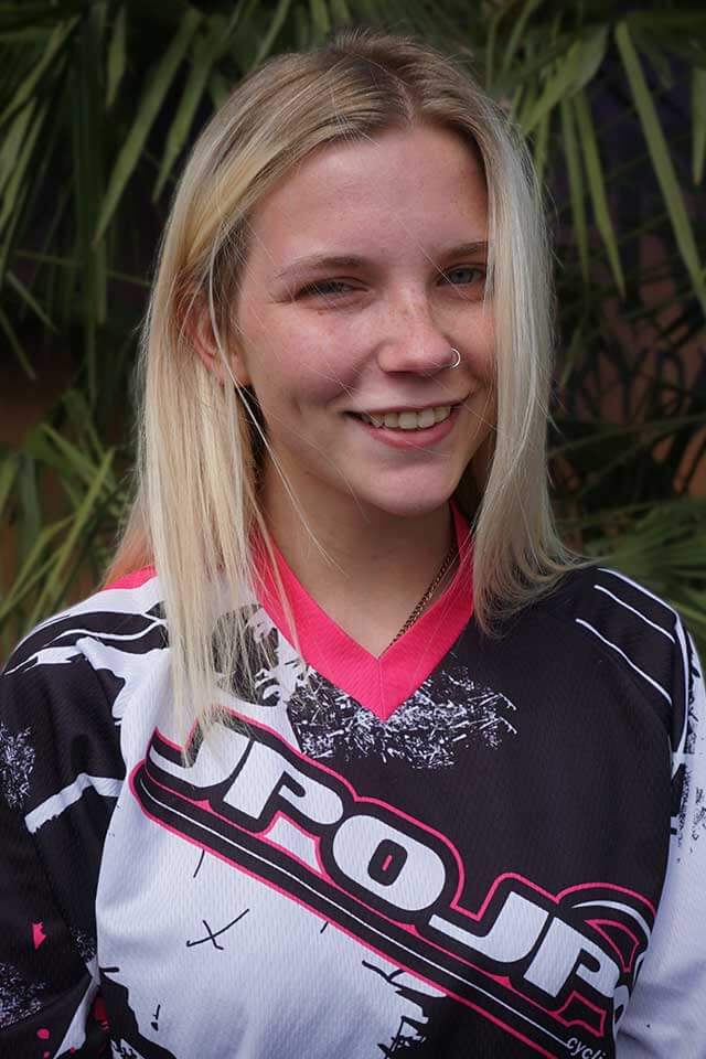 A smiling image of Skydive The Volcano's manifest staff Kyra Bush.